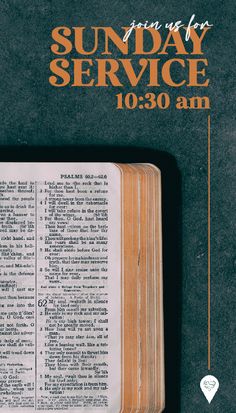 an open book sitting on top of a table next to a marker that says sunday service 10 30 am