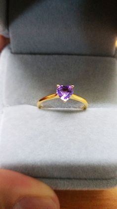 Amethyst Crystal 10k Gold Ring, Gemstone Purple Ring, Heart Ring 5mm Heart Cut, Amethyst Jewelry for Healing, Meditation Ring, Birthstone Ring, February Birthstone, Gifts for Her * Material: Amethyst gemstone, 10k real gold (It is not gold-filled or gold plated). * Made to order * Stone shape: Heart * Main stone: 1 natural Amethyst stone **Please be aware these are natural gemstones and coloring may vary** 💜 Amethyst is the birthstone for February, so if you're shopping for a February birthday Yellow Gold Amethyst Heart Cut Jewelry, Amethyst Heart Cut Ring For Anniversary, Valentine's Day Heart Cut Amethyst Ring, Heart Cut Amethyst Birthstone Ring Fine Jewelry, Heart Cut Birthstone Ring In 14k Gold, Fine Jewelry Amethyst Heart Cut Birthstone Ring, Heart Shaped Amethyst Ring With Center Stone As Gift, Heart-shaped Amethyst Ring With Center Stone As A Gift, Heart-shaped Amethyst Ring With Center Stone For Gift