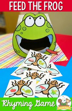 a frog with its mouth open and some stickers on it, sitting next to the words feed the frog