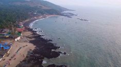 an aerial view of the beach and ocean