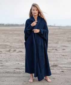 "Navy cardigan, Dark blue coat, Oversized cardigan, Chunky sweater, Basic clothing, Chunky knitwear, Long coat, Minimal Women clothing *Product colors may vary depending on the screen Free shipping worldwide This item can be made in any size and color (1-2 weeks for production). Contact us, and we will advice about color availability and measures required. The wool is machine washable with program of \"wool\" or \"delicate\" Low temp. 30o Designed & Created by Gurenkova Knitwear" Oversized Cozy Sweater Coat For Loungewear, Cozy Blue Sweater Coat For Winter, Blue Oversized Sweater Coat, Cozy Long Sweater Coat, Oversized Cozy Long Cardigan, Blue Shawl Collar Cardigan For Fall, Oversized Blue Knitted Outerwear, Cozy Long Sweater Coat For Loungewear, Blue Oversized Knit Outerwear