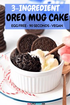 an oreo cookie in a white bowl with whipped cream and chocolate cookies on the side