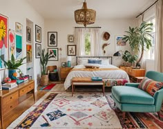 a bed room with a neatly made bed and lots of pictures hanging on the wall