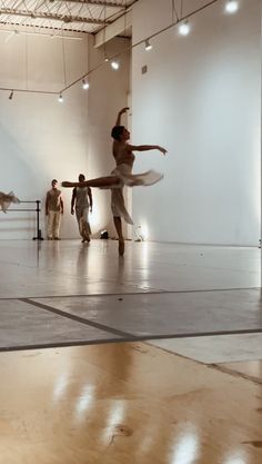 a group of people in a dance studio