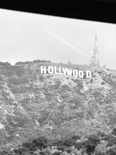 the hollywood sign is on top of a mountain