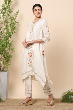 Buy Kaveri White Linen Kurta And Pant Set Online | Aza Fashions White Floral Embroidery Bottoms For Wedding, White Cotton Sets With Embroidered Hem, Festive White Sets With Embroidered Hem, Traditional White Bottoms With Floral Embroidery, Fitted Sets With Embroidered Border For Spring, Spring Off White Sets With Embroidered Border, White Lace Work Sets For Summer, White Lace Work Summer Set, White Lace Trim Sets For Spring