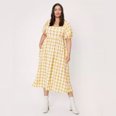 Nasty Gal Yellow Checkered Smocked Midi Dress Nwt. Ordered This Dress From Nasty Gal A Few Years Ago, But It Never Fit My Upper Body. It Is Uk 26 (Us22) But Would Work Better On Bustier Individual. Gingham Dresses With Smocked Bodice And Puff Sleeves, Summer Gingham Dress With Smocked Cuffs, Spring Smock Dresses For Picnic, Spring Smocked Dress For Picnic, Smocked Dress For Spring Picnic, Spring Smocked Dress For Picnics, Spring Gingham Dresses With Smocked Cuffs, Casual Yellow Midi Dress With Smocked Back, Gingham Dress With Smocked Back For Daywear