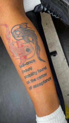 a person with a tattoo on their arm that reads balance, nourishment, and stability found at the center of an arrangement