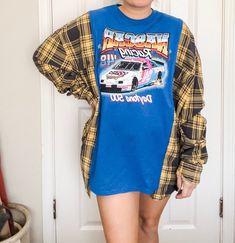 "NASCAR + Bleached Flannel Rework DAYTONA 500 Sizing: Sizing is very forgiving on these pieces. They are created to be a more oversized fit. Please see measurements and approximate sizing below. APPROXIMATE SIZE for this particular rework: Will fit sizes SMALL - 3XL PLEASE be sure to measure yourself with the provided measurements below and keep in mind that these are supposed fit a bit more oversized. MEASUREMENTS: Shoulder to Shoulder - 16\" Shoulder to Bottom Hem - 28.5\" Armpit to Armpit - 3 Fall Pullover, New Braunfels, Daytona 500, Womens Tunics, Slow Fashion, Nascar, Womens Clothing Tops, Plus Size, Tops & Tees