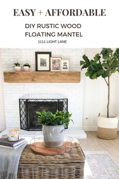 a living room with a fireplace, potted plant and pictures on the wall above it