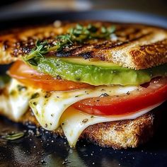 Butter the inside of bread.\nLayer avocado, cheese, tomato, salt, and pepper.\nTop with another bread slice.\nButter the outside and cook until golden.\n#SandwichIdeas #CheeseLovers #AvocadoRecipe\nMelted cheese, refreshing avocado, and flavorful tomato makes an appetizing combination that everyone will surely love. The low-carb bread helps keep it healthier. Tomato Grilled Cheese, Mozzarella And Tomato, Green Bean Salad Recipes, Body Care Recipes, Perfect Dinner Party, Full Recipes, Green Bean Salads, Bean Salad Recipes, Grilled Sandwich