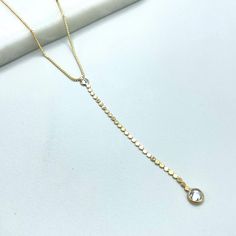 18k Gold Filled 1mm Box Chain with Clear Cubic Zirconia Detail and Long Drop Necklace, Wholesale Jewelry Making Supplies. Necklace Size: -Length: 1mm / Thickness: 1mm Cylinder:  -Length: 3.2 inches / Thickness: 2mm CZ Big: 5mm                CZ Small: 4mm 💎 With new products daily, quality and competitive  prices, in DiJu Jewelry you find the most unique styles of modern designs, always looking for elegance and market trends.   *Helping your Jewelry Businesses Grow *Starting your Own Business *Making your Own Collection: DiJu Jewelry ever brings Better Moments for your Life.   📲 Find many more styles in our DiJu Jewelry Etsy Store. https://www.etsy.com/shop/DJDiJuJewelry   💎 You can choose from unique styles of earrings, necklaces, pendants and charms, bracelets, anklets, rings, chokers Gold Cubic Zirconia Jewelry With Box Chain, Gold Diamond Necklace With Box Chain For Anniversary, Gold Cubic Zirconia Box Chain Necklace, Gold Delicate Chain Necklace With Cubic Zirconia, Gold Cubic Zirconia Diamond Cut Chain Necklace, Long Drop Necklace, Market Trends, Solid Gold Jewelry, Necklace Size