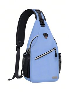 a light blue sling bag with black straps