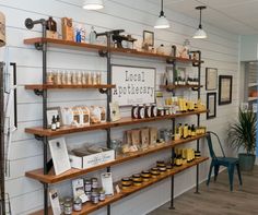 the inside of a store with shelves full of goods