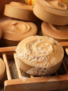 several wooden bowls filled with different types of food