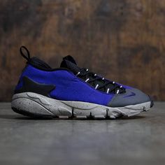 Nike Men Air Footscape Nm (court purple / black-light taupe) Purple Lace-up Sneakers With Textured Sole, Purple Sneakers With Vibram Sole For Streetwear, Sporty Purple Sneakers With Textured Sole, Purple Streetwear Sneakers With Vibram Sole, Mens Nike Air, Purple Black, Black Light, Men's Nike, Purple And Black