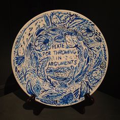 a blue and white plate with writing on it that says please for throwing in arguments