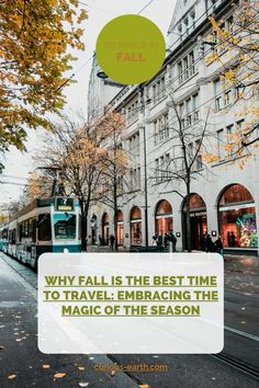 a bus driving down a street next to tall buildings with trees in the foreground and text overlay that reads, why fall is the best time to travel embracing the magic of the season