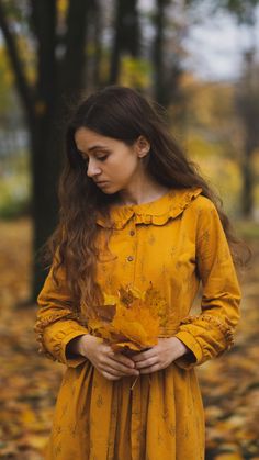 flannel dress in mustard color with twig print. flounces are sewn on the sleeve and collar. the bottom of the skirt also has a frill. Skirt length from waist down 78cm Yellow Long Sleeve Dress For Fall, Fall Dresses With Ruffled Collar And Ruffles, Yellow Cotton Dress For Fall, Fall Dresses With Ruffles And Ruffled Collar, Fall Cotton Smock Dress, Long Sleeve Embroidered Folk Peasant Dress, Multicolor Folk Long Sleeve Dress, Flannel Over Dress Maternity, Flannel Robe