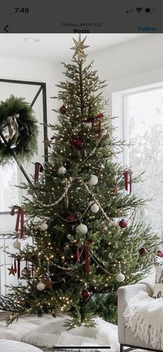 a decorated christmas tree in a living room