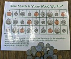 a bunch of coins sitting on top of a table next to a sign that says how much is your word worth?