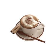 a cappuccino on a saucer with cinnamon sticks