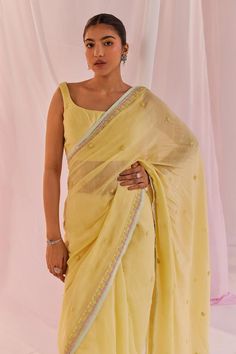 Yellow saree in silk chanderi featuring dori embroidery with pearl and sequin embellishments. Paired with a matching padded square neck sleeveless blouse., Fit: Relaxed Dori Embroidery, Square Neck Blouse, Saree Blouses Online, Yellow Saree, Yellow Silk, Indian Sarees Online, Blouse For Women, Fashion Inspiration Design, Designer Gowns