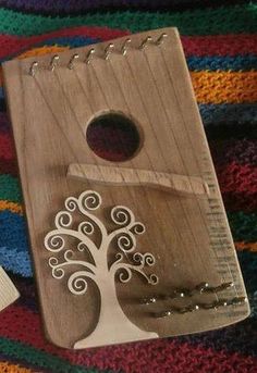 a wooden notebook with a tree on it