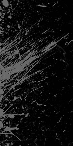 an abstract black and white background with paint splatters