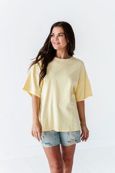 Features Round Neck Short Sleeves Pastel Yellow Color 100% Cotton Size + Fit Small 0-4, Medium 4-8, Large 8-12 Kristin is 5'4", a size 1 and is wearing a Small Oversized fit, size down if you want less oversized. Above recommendation is for an oversized fit. Click here for shorts in photos Click here for shorts in Aimee's try on video