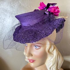 This Hat Is A Showstopper! Everything About It Is Outstanding And Uniquely Beautiful. The Medium Flat-Topped Crown Is Made Of Fine Purple Straw, And It Tilts Forward As Photographed. The Brim Is Made Of A Matching Color "Crocheted" Straw, And The Brim Continues Towards The Back, But Leaves An Opening Between The Crown And The Brim. At The Back There Are Gorgeous Purple And Fuchsia Fabric Flowers/Leaves.Around The Brim There Is A Matching Piece Of Veil Attached To It, To Add Drama...The Veil Does Fuchsia Fabric, York Dress, The Veil, Flowers Leaves, Fashion History, Hats Vintage, The Crown, Fabric Flowers, Face Shapes