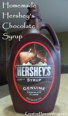 a bottle of hershey's syrup sitting on a counter top with the caption, homemade hershey's chocolate syrup