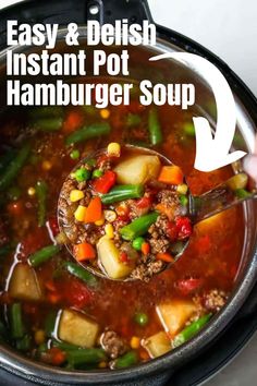 a ladle full of beef and vegetable soup with the title super easy instant pot hamburger soup