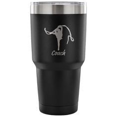 a black tumbler cup with the word coach on it and a silhouette of a woman doing