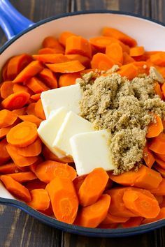 carrots and butter in a skillet on a wooden table