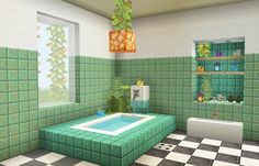 a bathroom with green tiled walls and flooring