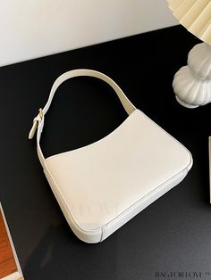 BagForLove - Sleek Baguette Bag: The Epitome of Minimalist Elegance Product Description Color White Type Baguette Bag Bag Size Small Strap Type Adjustable Style Elegant Pattern Type Plain Composition 100% Polyurethane Material PU Leather Size Chart INCH CM Bag Length Bag Width Bag Height Handle Height 9.1 inch 2.4 inch 5.9 inch 8.7 inch Bag Length Bag Width Bag Height Handle Height 23 cm 6 cm 15 cm 22 cm Details Pictures Similar Products h2 { text-align: center; } /* æ¢è¡ */ li{ white-space: n Classic Rectangular Hobo Bag With Single Strap, Classic Rectangular Hobo Bag With Single Shoulder Strap, Elegant White Baguette Bag With Adjustable Strap, White Handheld Baguette Bag For Evening, Classic Cream Rectangular Baguette Bag, White Handheld Baguette Bag For Daily Use, Classic White Tote Baguette Bag, Classic White Baguette Tote Bag, White Square Baguette Bag