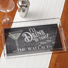 a table topped with two wine glasses next to a sign that says i'll drink go time the wallaceacs