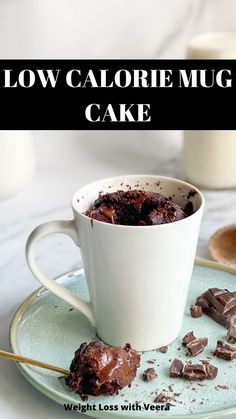 low calorie mug cake on a plate with spoon