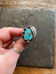 Handmade Royston Turquoise and sterling silver statement ring.  -Ring will fit US Size 6.5 American Southwestern Vintage style design. Beautiful striking sky blue color with unique warm brown matrix. Flower design with leaf accent. Hand polished Rustic looking patina with high polish finish.  Double split style shank/band. Hand stamped Rising Sun and Arrow hallmark on backside. Turquoise stone is from the Royston mine in Nevada. 100% Sterling silver. --------------------- Every piece will come p Feather Ring, Royston Turquoise, Silver Feather, Statement Ring Silver, Leaf Flowers, Western Jewelry, Paper Jewelry, Native American Jewelry, Turquoise Sterling Silver