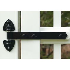 an image of a white door with black hardware