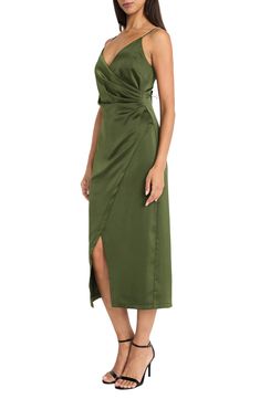 This figure-flaunting midi dress fashioned with a faux wrap front is topped with rhinestone adorned straps for a show-stopping look. 40 1/4" length (size Small) V-neck Spaghetti straps Lined 98% polyester, 2% spandex Dry clean Imported Bold Lip, Midi Wrap Dress, Illusion Dress, Wrap Midi Dress, Maggy London, Flowing Skirt, Morganite, Fitted Bodice, Fit & Flare