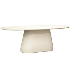 an oval white table on a white background