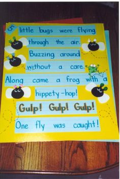 a bulletin board with words and pictures on it that read,'little bugs were flying through the air buzzing around without a care