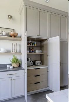 the kitchen is clean and ready to be used as a storage area for food items