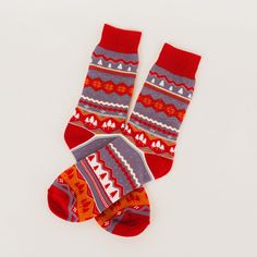 These Tree Snowflake Unisex Socks will have you feeling like you're walking on air! Show off your flair with this vibrant two-tone red and purple pattern with trees and snowflakes. A perfect gift for the adventurous and unique! Get your feet feeling extra cozy this season! A Montana Scene Original Design. Printed in Montana. All designs are property of The Montana Scene. All rights reserved. All of The Montana Scene apparel is designed and printed locally in Montana. Come visit our storefront lo Warm Red Casual Socks, Cozy Red Socks For Winter, Cozy Red Winter Socks, Comfortable Warm Red Socks, Nordic Style Winter Socks For Gift, Casual Purple Socks For Gift, Casual Purple Socks For Gifts, Casual Purple Socks As Gift, Red Socks For Winter Gifts