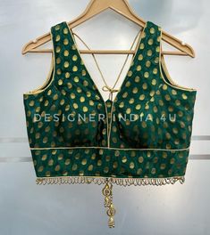 This is a readymade green silk blouse.   FABRIC DETAILS: >Blouse is in Zari Work Embroidered Silk Fabric. SIZE & STYLE: >You can either use a standard sizing or Custom Sizing. >Please refer listed image for standard sizing chart. >If you want custom size then we will send you measurements form after your order. And discuss all the customisation in detail before processing the order. >You can let us know for Blouse style changes e.g. change of neck designs etc. >Specific to sleeves on the blouse, please write in order notes if you want a sleeveless blouse to have sleeves or vice versa or just drop a message to us. >Tassels & Trims may or may not be exactly same always. >We ensure to show you final product and measurement images before dispatch. We also expect if there are few minor size alt Blouses For Saree, Green Silk Blouse, Lehenga Top, Velvet Fabrics, Saree Lehenga, Designer Silk Sarees, Saree Blouses, Silk Saree Blouse, Blouse Style