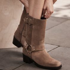 Neutral-tone suede mid-calf length boots featuring a square toe, ankle strap design, low block heel, gold-tone hardware with an adjustable buckle fastening through the sides. Calf Length Boots, Suede Biker, Timeless Dress, Mint Velvet, Low Block Heels, Strap Design, Biker Boot, Mid Calf