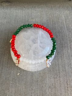 Red. White and green Christmas charm bracelet Red White And Green Christmas, White And Green Christmas, Clay Bracelets, Clay Bracelet, Christmas Charms, Christmas Jewelry, Bead Jewellery, Green Christmas, Colorado Springs