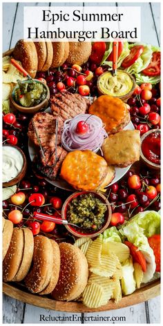 a platter full of food with the words epic summer hamburger board